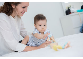 Plan Toys - Triangle Clutching Toy Pastels - Modern Brands Australia